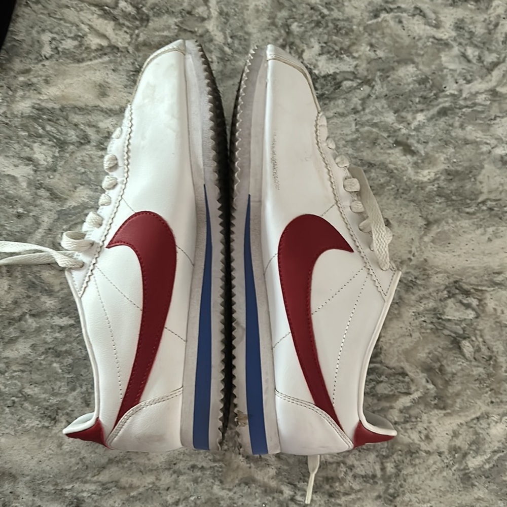 Nike Cortez - white leather, red swoosh, blue stripe on side sole